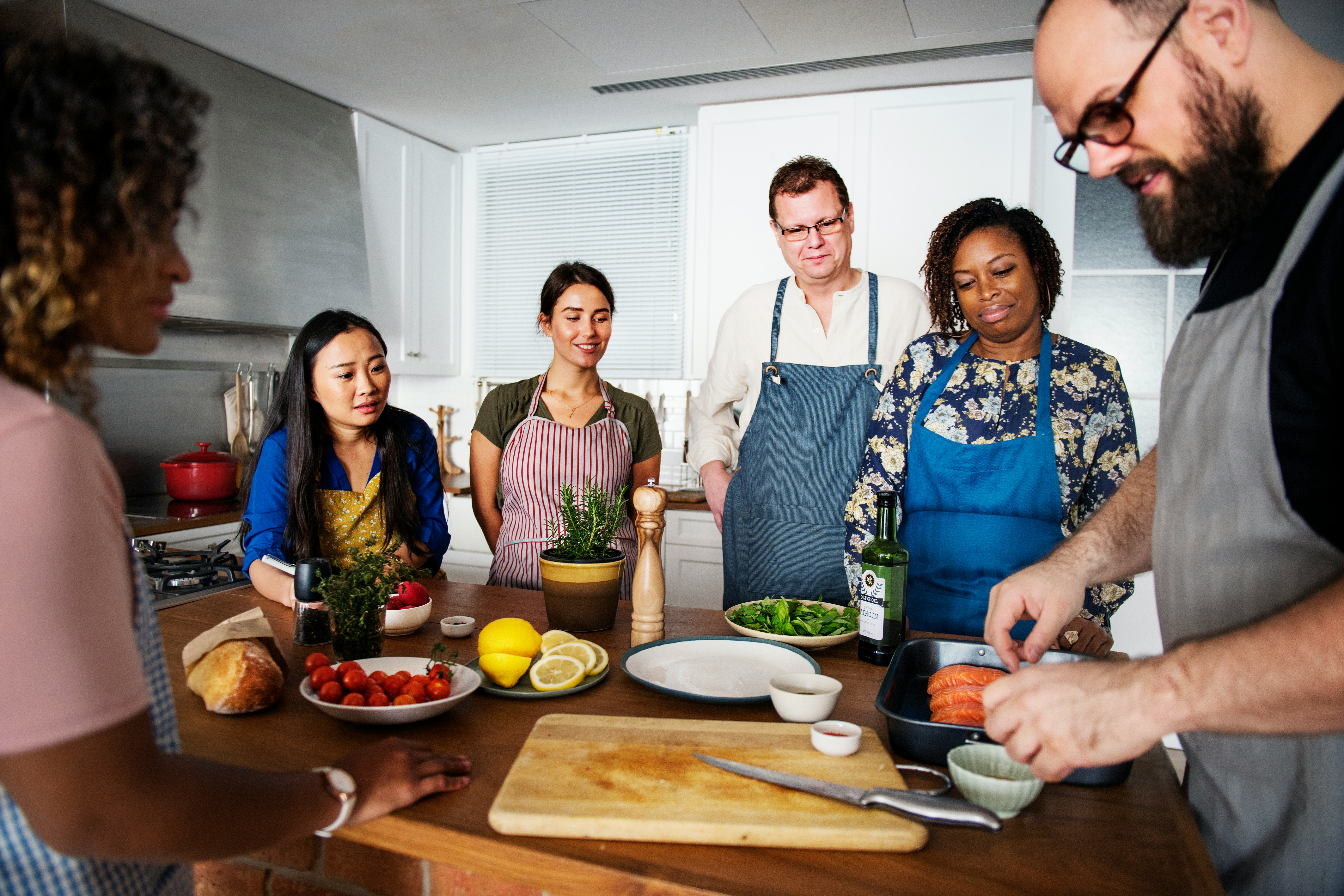 Travelers preparing fresh food together